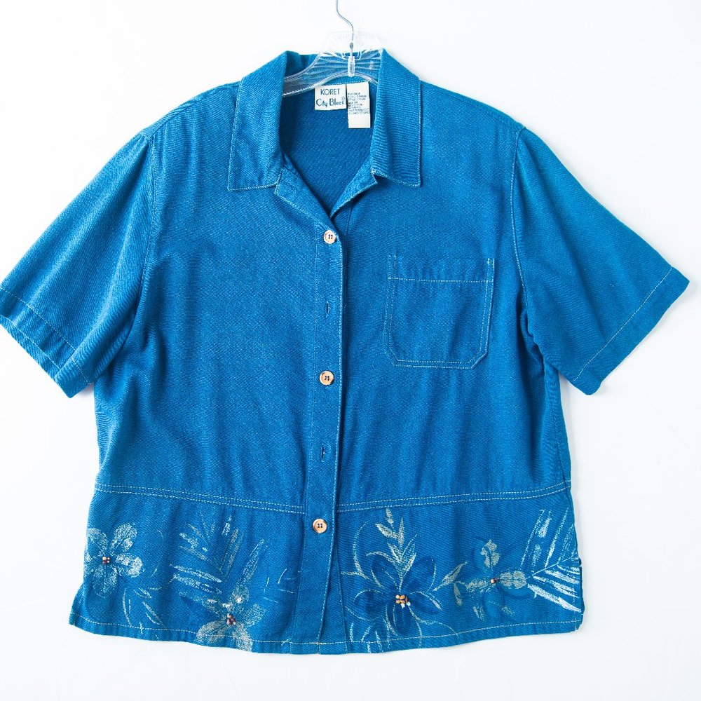 Women's Koret button down denim top with flower print at the bottom Size medium
